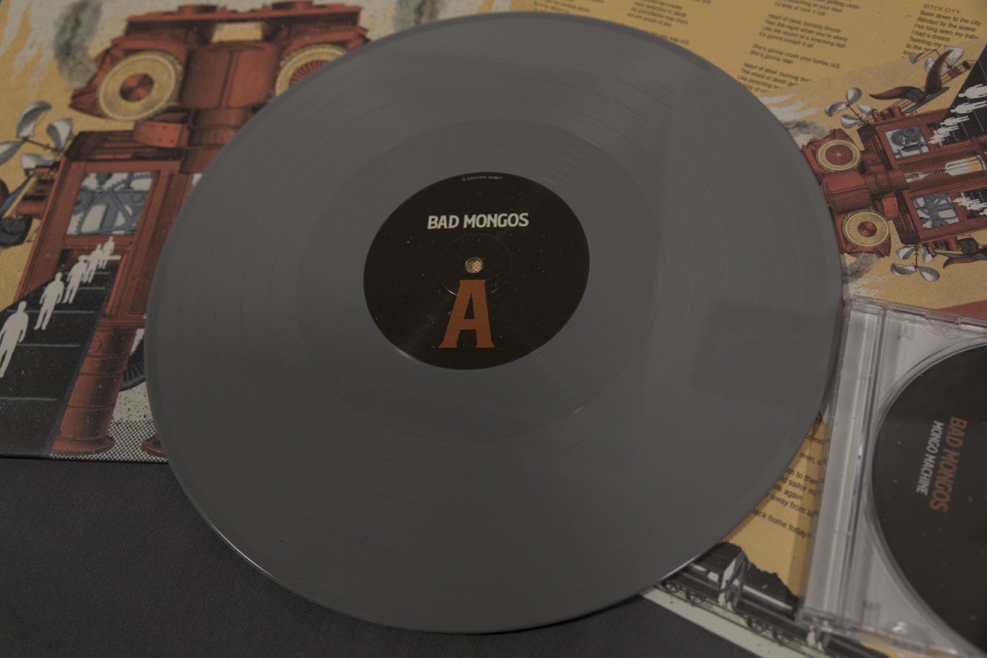 BAD MONGOS - Mongo Machine - Vinilo 12” + CD Jewel box